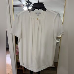 CHAUS Women’s dress shirt. Gold button closure at neck.